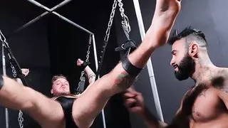 Restrained blonde stud Chad Hammer foot tormented by dom