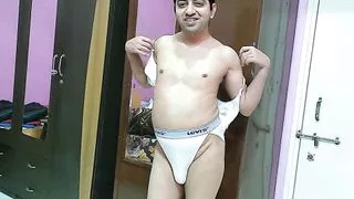 Sexy Sissy crossdresser femboy in white bra-pantie.