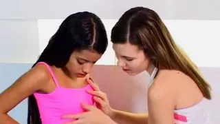 Gorgeous petite lesbians finger and lick