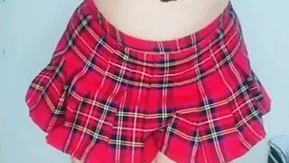 Sexy Mexican in miniskirt takes her ass out