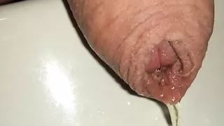 Close up uncutted pissing cock