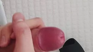 having fun and massaging his penis