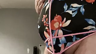 Cock and ball bondage with swimsuit and nipple clamps