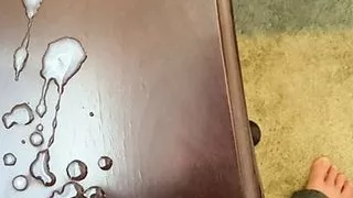 Blowing a load of cum on the table