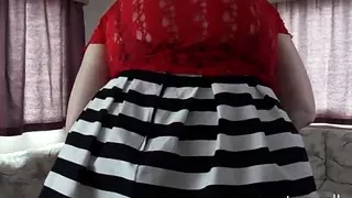 Sally showing off her red 6 strap suspenders and stockings