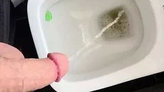 Young stud is pissing first time on Video