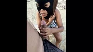 little bitch sucking on the beach and giving her anus