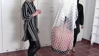 Amber and Carla kick slave in net