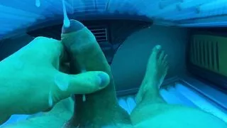 Cumshot in public solarium