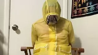 Yellow PVC raincoat bondage Part 2