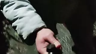 Sissy Jayci walking in a hail storm