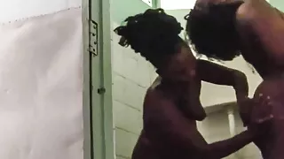 Amateur lesbian make-out in public shower changing room