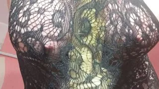 Titjob through fishnets dress