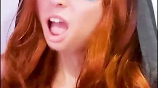 Married redhead having fun on cellphone