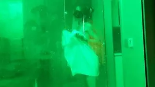 Slutty whore takes a shower in the hotel bathroom before fucking her lover