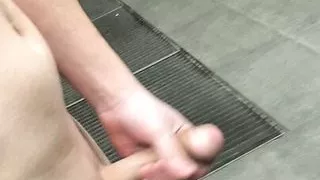 Naked fag does risky walk next to the shopping center
