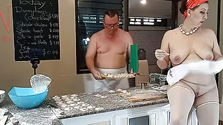 Nudist housekeeper Regina Noir cooking in the kitchen. Naked maid makes dumplings. Naked cooks. Part 3
