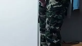 Hot hunk shows his cock in military pants