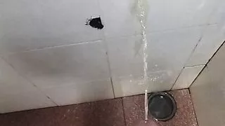 Pissing on the wall, man cock dripping
