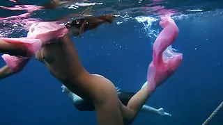 Monica in the pool and girls in the sea