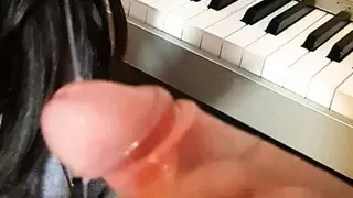 Blowjob on the piano - again interrupted by a hard cock.