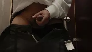 Chinese young man gives handjob in public toilet