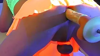 Sissy Lucy Machine Fucked by Glowing Dildo Whilst Locked In Chastity