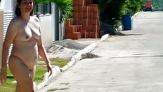 Nudist housewife on the street and in the front yard