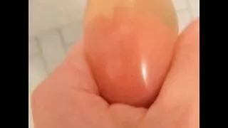 Erika Oak Pisses In A Latex Condom