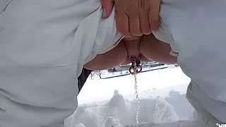 Nipple ring lover pissing outdoor in snow flashing huge pierced nipples and pierced pussy with stretched pussy lips