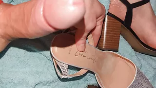 Silver high heels of milf get spunk cum dripped down and collects on the sole