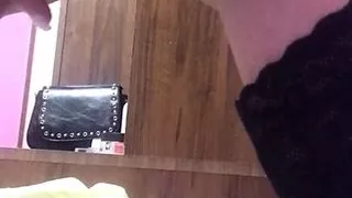 A bitch in a leather outfit shows tits