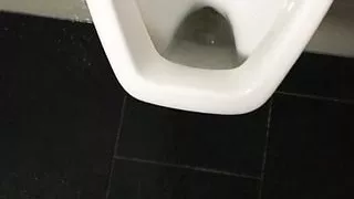 Pissing over the toilet at work