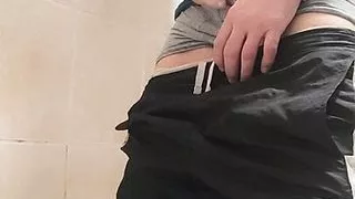 Pissing in my shiny Nike trackies again and nice spray in my mouth!