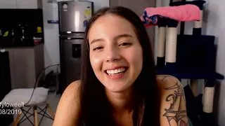 Sexy tattooed girl with the face of a good girl misbehaves on her webcam show while she masturbates