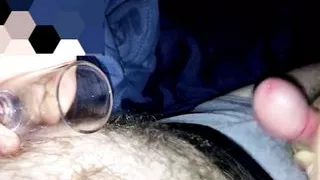 Hairy pup and hung boy take turns milking their cocks to cum in shot glasses