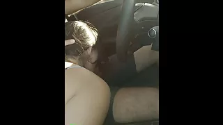 Lover on the road receives handjob and blowjob while driving