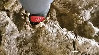 Crossdresser POV mud walk in red shoes, nylon tights, leotard and miniskirt til mud sucks my high heels off my muddy fee