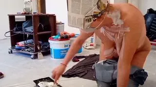 Mom paints the walls and pours paint in her pussy