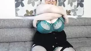 Slutty Sally shows off her huge K cup boobs