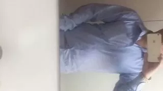pissing at the office toilet with a hard on