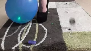 Princess Kirstin crushing balloons