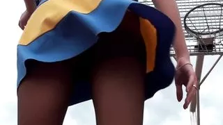 Lorine in Cheerleader Uniform and Pantyhose Shooting Balls and Flashing