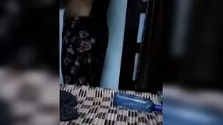 Indian wife changing clothes, husband making video