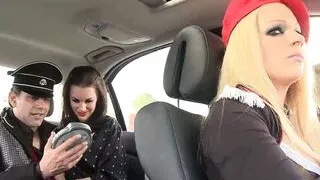 A threesome between a blonde and a brunette with a hard cock