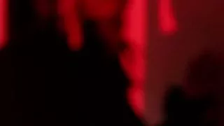 Do you like red? Miss Rhodes in the red light