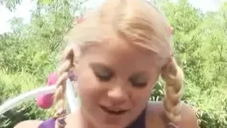 Petite blonde toys her hot pink pussy