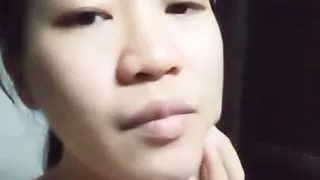 Asian girl is bored at home alone