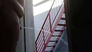 Mofo2121 pissing  out the back door