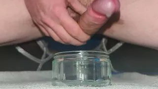 4k Man wanks and cums wearing stockings and heels. Precum oozing and thick load in glass. Moaning and slow cumshot.